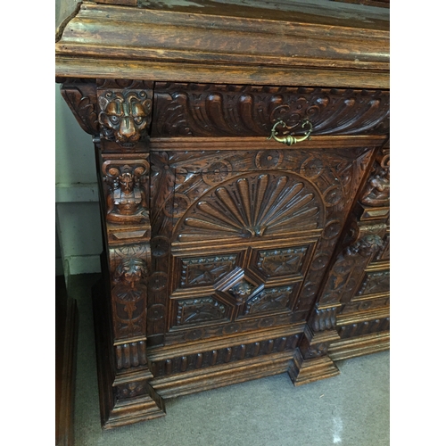 50 - Profusely Carved French Two Piece Hunt Cabinet 256 cms High X 153 X 57