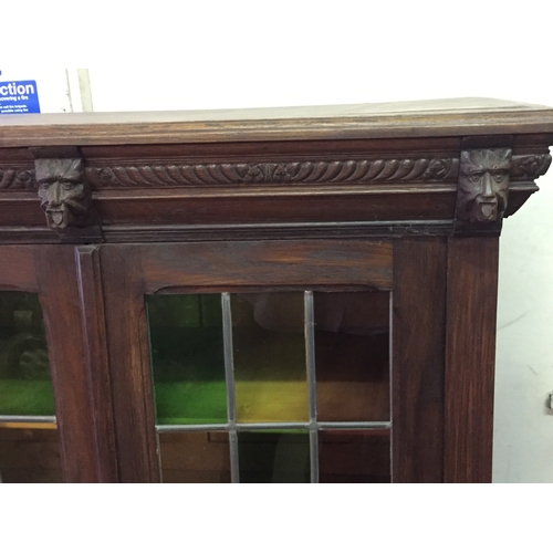 58 - European Glazed Bookcase  With Carved Decoration 51 x 112 x 49 Cms