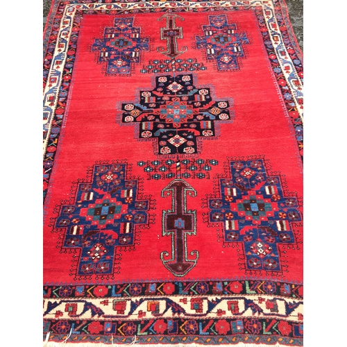 82 - Hand knotted Rug/Carpet 211 cms x 64 cms