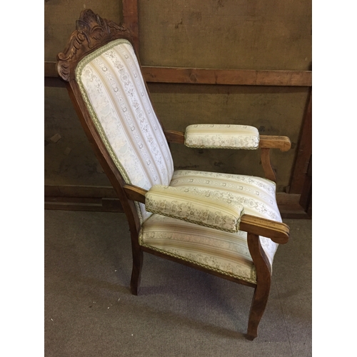 32 - Upholstered French Chair With Carved Wood Decoration.