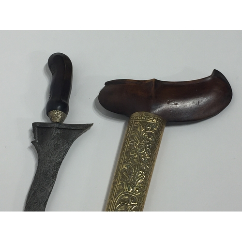 190 - Antique Kriss Or Keris ,Detailed Blade With Brass And Wood Scabbard