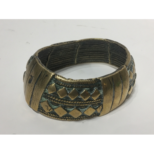 128 - Early Bronze Tribal Art Currency Bracelet.