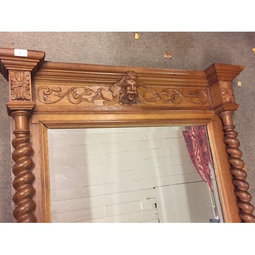 61 - Large Carved Oak Mirror, With Carved Figural Top And Twist Columns . 183 x 115 cms