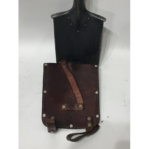 174 - A WW2 Swiss Army Entrenching Tool With Leather Dated Cover.