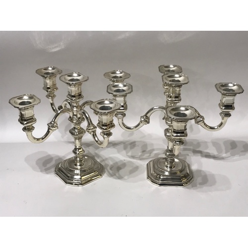 120 - Pair Of Silver Plated Candelabra. 23 cms High.