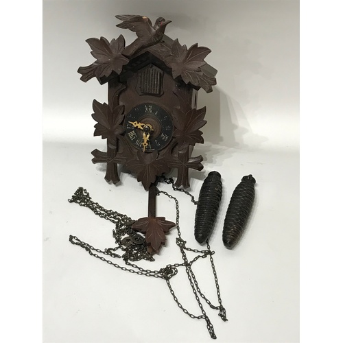 123 - Vintage Cuckoo Wall Clock With Weights And Pendulum.