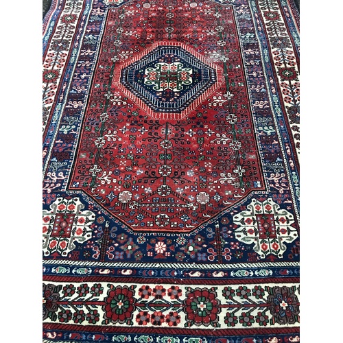 87 - Korashan Hand Knotted Rug With Floral Borders 300 x 196 cms