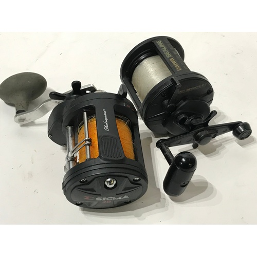 441 - 2 X Multiplier Fishing Reels , Shakespeare Sigma Along With A Daiwa Sealine.