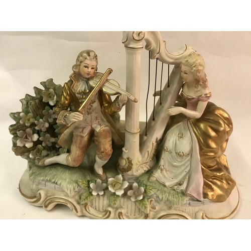 107 - Large Ceramic Figure Of Harp Player And Violinist With Registration Number To Base 38 X 29 Cms