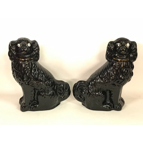 130 - Pair Of Black Staffordshire Style Ceramic Dog Figures. 30 cms High