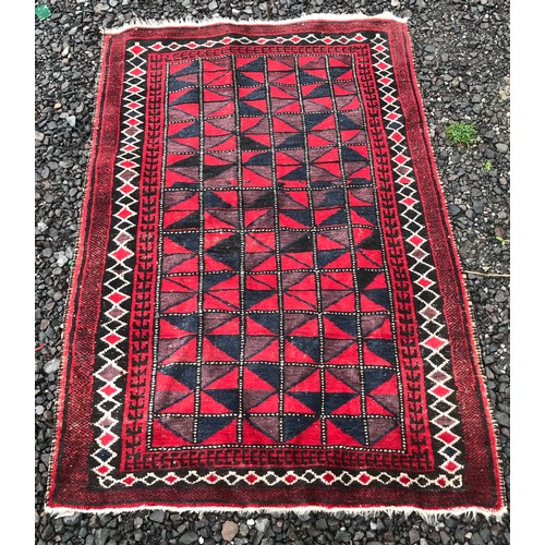 64 - Hand Knotted Rug With Central Pattern.151 x 102 cms