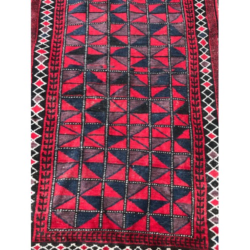 64 - Hand Knotted Rug With Central Pattern.151 x 102 cms