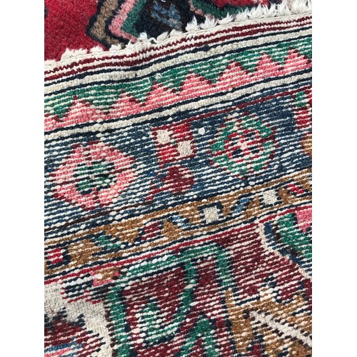 67 - Decorative Hand Knotted Rug 208 x 102 cms