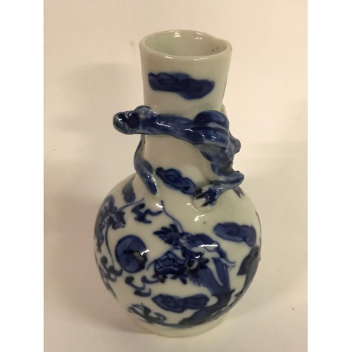 637 - Small Oriental Blue And White Dragon Decorated  Vase. 9cms High.