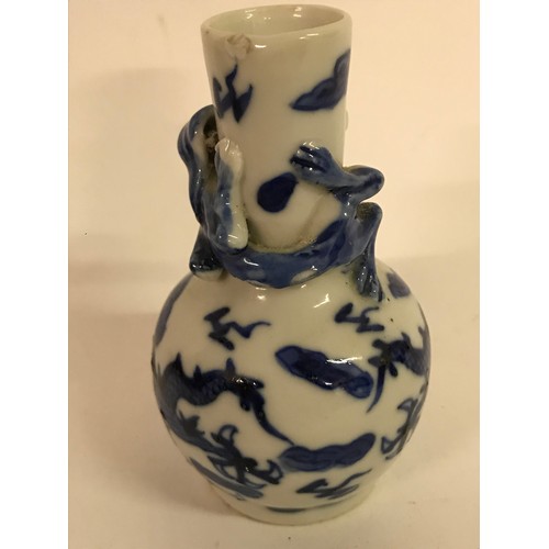 637 - Small Oriental Blue And White Dragon Decorated  Vase. 9cms High.