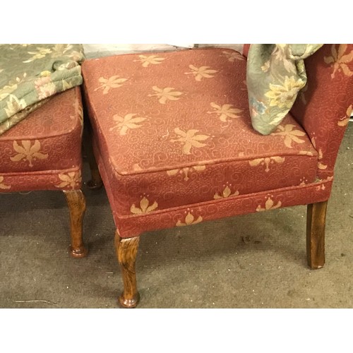 81 - A Pair Of Upholstered Chairs With Covers.