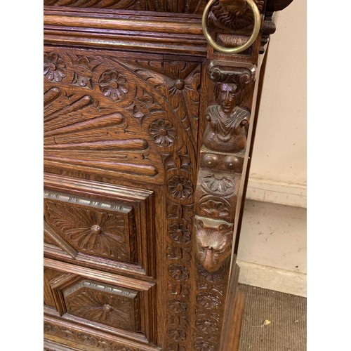 1 - Two Piece Carved Wood European Cabinet With Carved Wood Figural Adornments . 47 x 108 x 183 cms