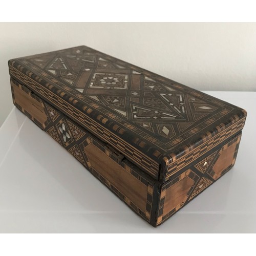 104 - Intricately Inlaid Vintage Sadelli Box
20 x 12 x 7 cms