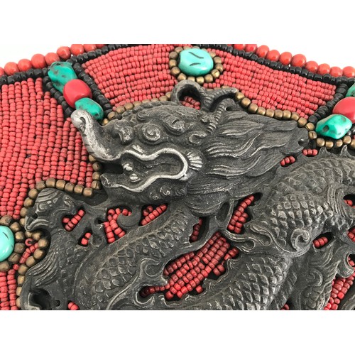 147 - Rare Tibetan Bead Work Wall Hanging Plaque Having White Metal Dragon Decoration.
32 x 22 cms