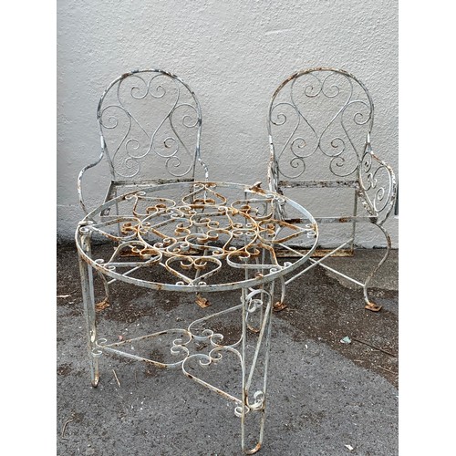 68 - Two Vintage Metal Garden Chairs Along With A Circular Metal Garden Table. (3)