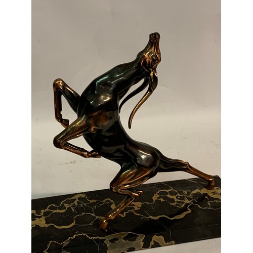 395 - Good Sized Art Deco Figure Of A Mounted On Marble Antelope. 40 x 36 cms