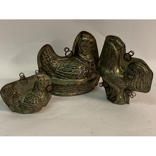 404 - Three Antique Tin Belgian Chocolate Moulds Largest 19 x 20 cms