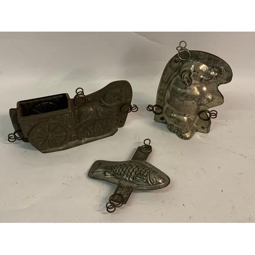 405 - Similar To Previous Lot Three Antique Tin Belgian Chocolate Moulds To Include Horse And Cart, Elepha... 