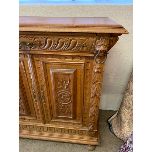 81 - Carved Wood Decorated European Cabinet. 94 x 46 x 102 cms