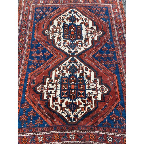 94 - Hand Knotted Rug With Two Central Motifs. 204 x 154 cms