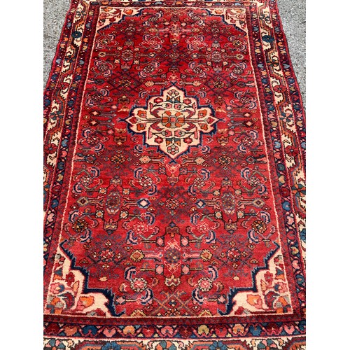 92 - Decorative Hand Knotted Rug With Central Lozenge. 232 x 143 cms