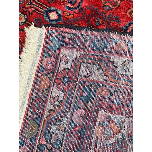 92 - Decorative Hand Knotted Rug With Central Lozenge. 232 x 143 cms