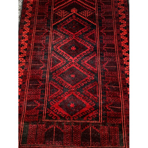 305 - Decorative Hand Tied Rug . 144 x 84 cms