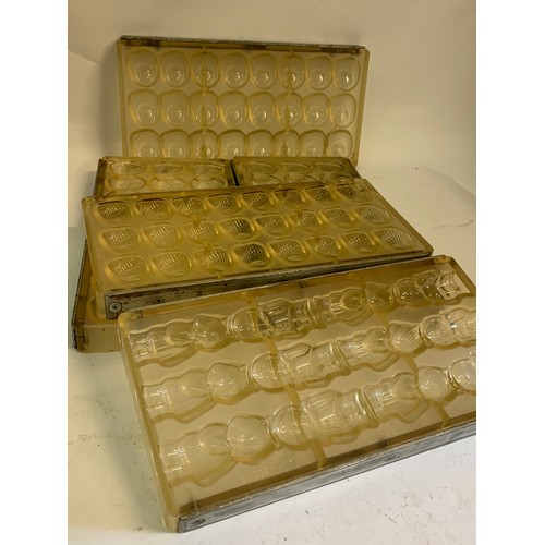 410 - Five Vintage Chocolate Plastic And Metal  Mould Trays. (5)