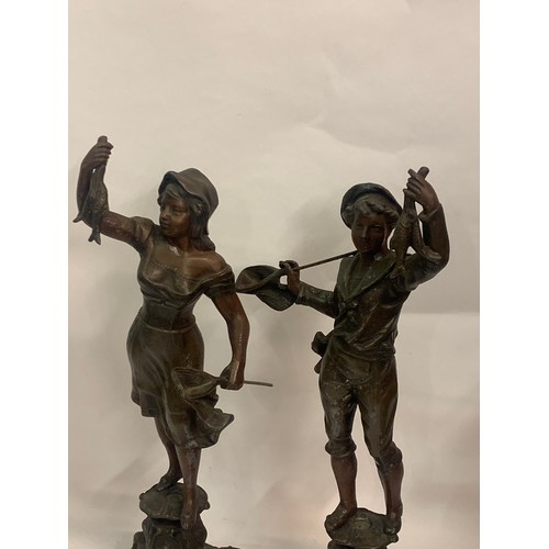 415 - Pair Of Antique Spelter Fishing Figures. 43 cms High