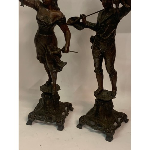 415 - Pair Of Antique Spelter Fishing Figures. 43 cms High