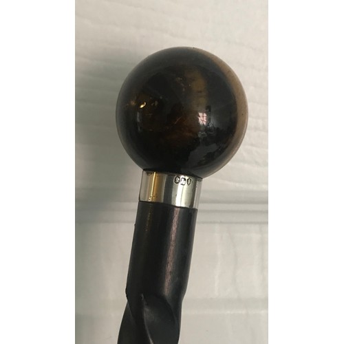 123 - Antique Ebony Walking Cane (small repair) With Tiger Eye Finial Having A Stamped Silver Collar