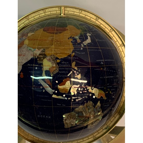 439 - Table top semi-precious stone inlaid terrestrial globe of the world Set In A Bras Frame. 35 cms High