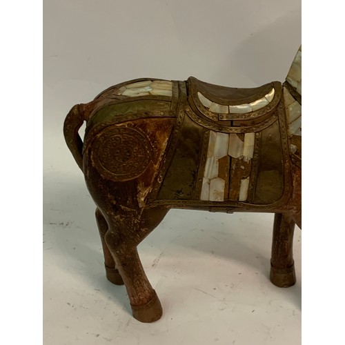 454 - Wood Figure Of A Horse With Brass And Mother Of Pearl Inlay. 29 x 30 cms