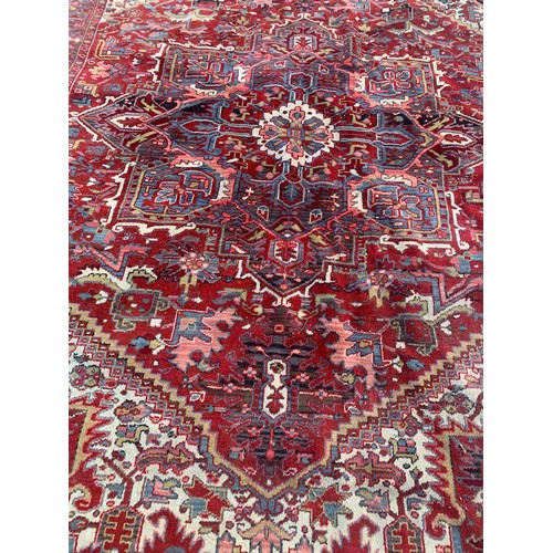 99 - Large Ground Rug With Decorative Border And Large Central Motif 328 x 234 cms