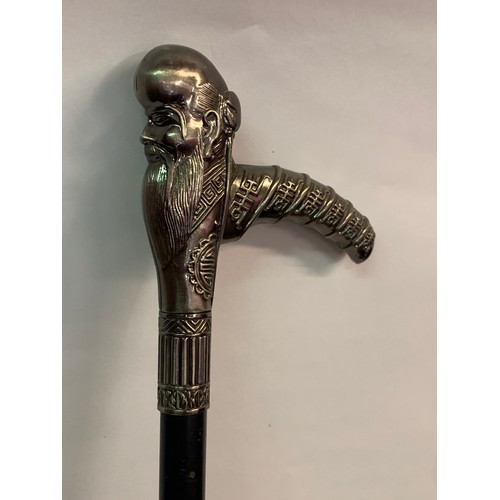 566 - Oriental Style Sword Stick With Immortal Head Handle.