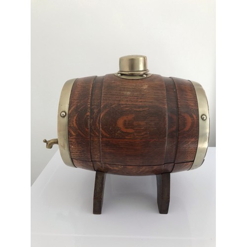 208 - Decanter In The Form Of A Barrel On Stand
22 h x 18 w