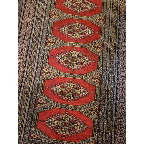 330 - Two Decorative Ground Rugs With Central Pattern, 128 x 77 cms  (2)