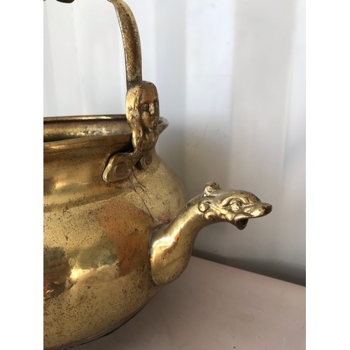 113 - Antique Hanging Brass Cauldron Having 
50 cms h x 26 cms diameter