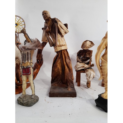 33 - 7 Figures to include 4 resin and 3 mexican papier mache figures. Tallest 34cm tall