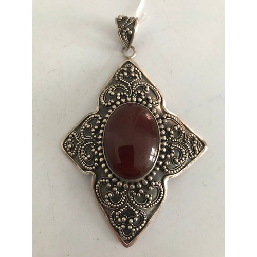 179 - Large Silver Pendant Marked 925
10.5 x 6.5 cms