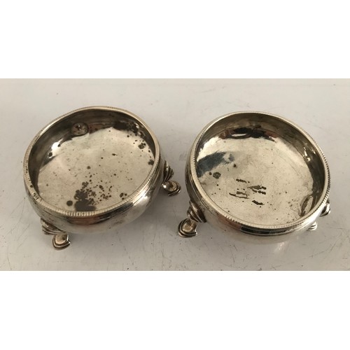 176 - Pair Of George 111 Hallmarked Silver Salt Cellars Standing On 3 Hoof Feet, 
 London 1811
6 cms diame... 