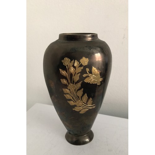 125 - Oriental Bronze Vase Etched With Floral Decoration And Butterfly
15.5 cms h