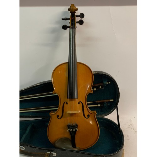 560 - Vintage Cased Violin Along With Two Bows