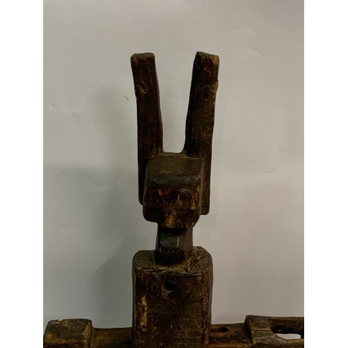 304 - Vintage Mounted Dogon Door Lock. 53 x 43 cms