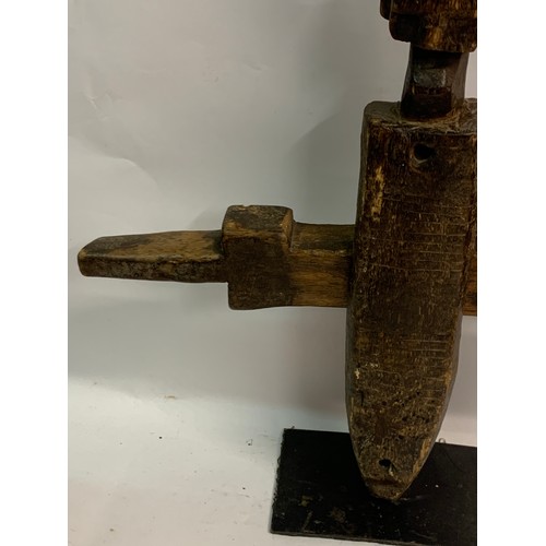 304 - Vintage Mounted Dogon Door Lock. 53 x 43 cms